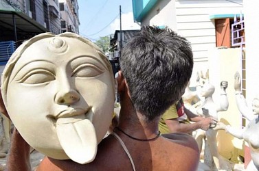 Artisans giving final touches to Goddess Kali idols ahead of Deepavali festival in Agartala. TIWN Pic Oct 18