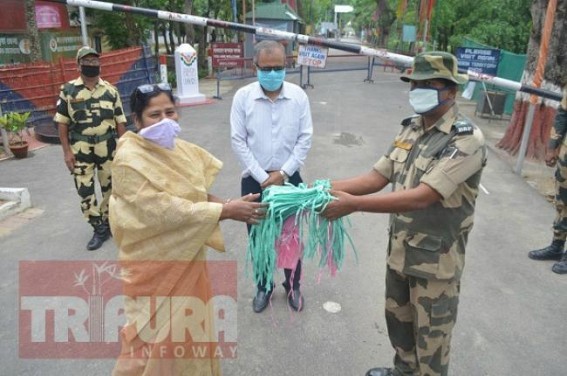 MP distributes masks among BSF Jawans, IGM hospital staffs
