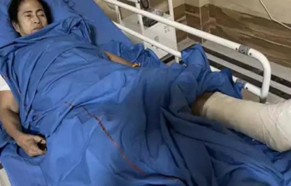 Mamata in hospital with plaster cast on her leg