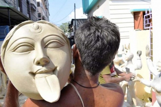 Artisans giving final touches to Goddess Kali idols ahead of Deepavali festival in Agartala. TIWN Pic Oct 18