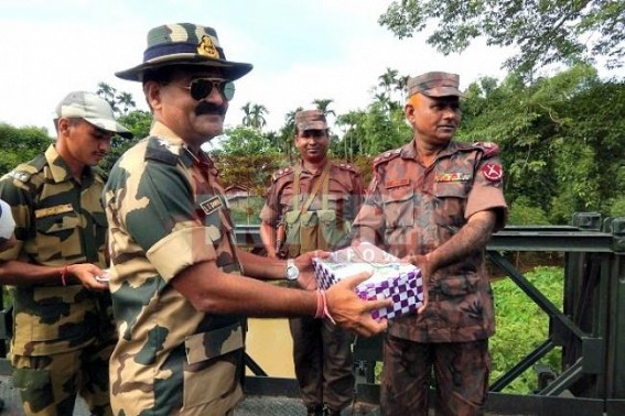 Amidst tight security BSF / BGB exchanged sweets on the occasion of Eid at North Tripura to  resume Indo-Bangla relation  