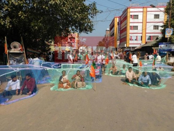 BJP conducts 'Mosquito-net' movement : Blocks Duga Chowmuhani road BJP conducts 'Mosquito-net' movement : Blocks Duga Chowmuhani road