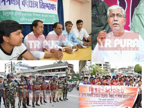 Chaos hits Agartala with 10,323 roars : State waiting to see 10,323 teachers' next step; 2 oppositions to file case, security tightened across the City Chaos hits Agartala with 10,323 roars : State waiting to see 10,323 teachers' next step; 2 oppositions to file case, security tightened across the City