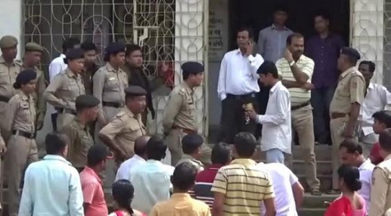 BJP goons attacked MP Jiten in front of Police Administration BJP goons attacked MP Jiten in front of Police Administration