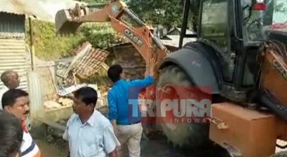 Bulldozing of illegal party offices continue in Tripura