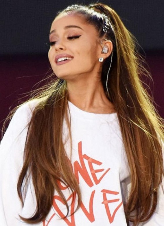 NASA exchanges tweets with Ariana Grande over her song