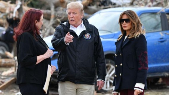 Trump signs Bibles during Alabama disaster visit Trump signs Bibles during Alabama disaster visit
