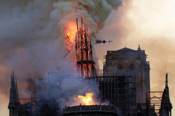 Notre Dame fire under control, main structure saved Notre Dame fire under control, main structure saved