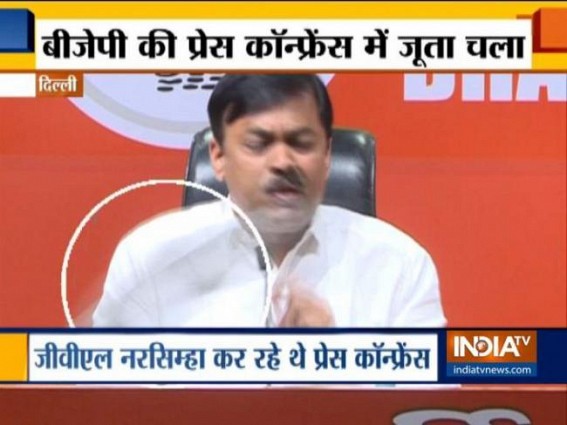 Shoe hurled at BJP spokesperson Shoe hurled at BJP spokesperson