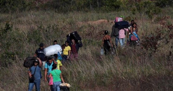 Venezuela reopens border where migrants used trails to reach Brazil