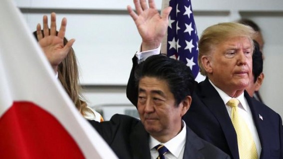 Asian shares up in muted trading after Trump visit to Japan Asian shares up in muted trading after Trump visit to Japan