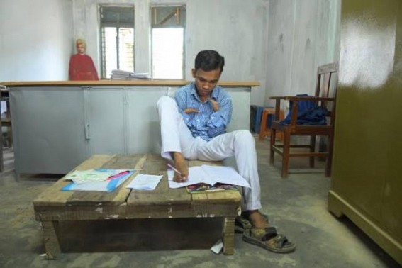 Daily wage workerâ€™s dibyang son bagged 1st division by writing with feet, letter marks in 2 subjects