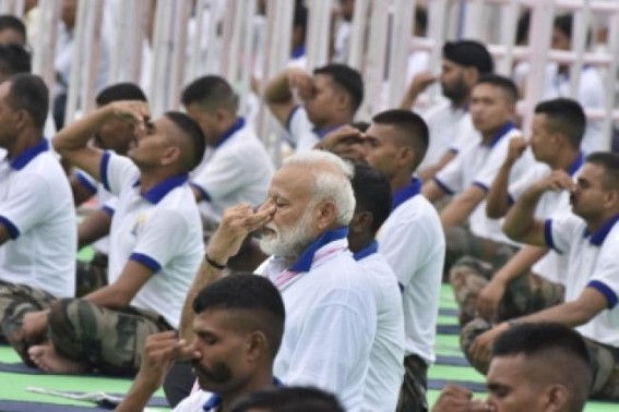 Yoga hasn't reached poor, tribals: Modi Yoga hasn't reached poor, tribals: Modi
