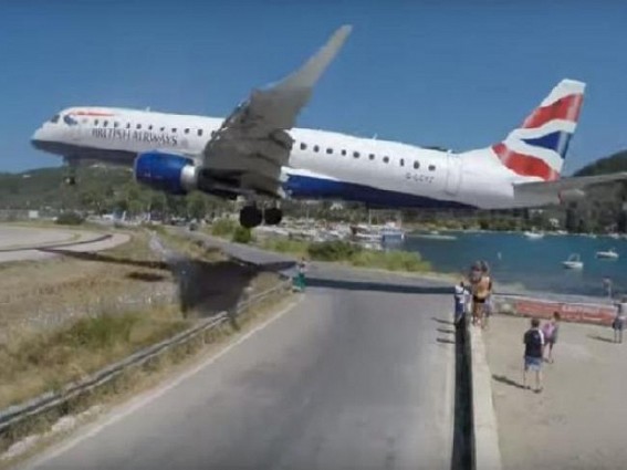 Plane lands few feet away from tourists, video goes viral
