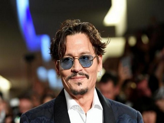 Johnny Depp defends his perfume advertisement