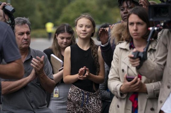 Teen climate activist tells US Congress to 'try harder'