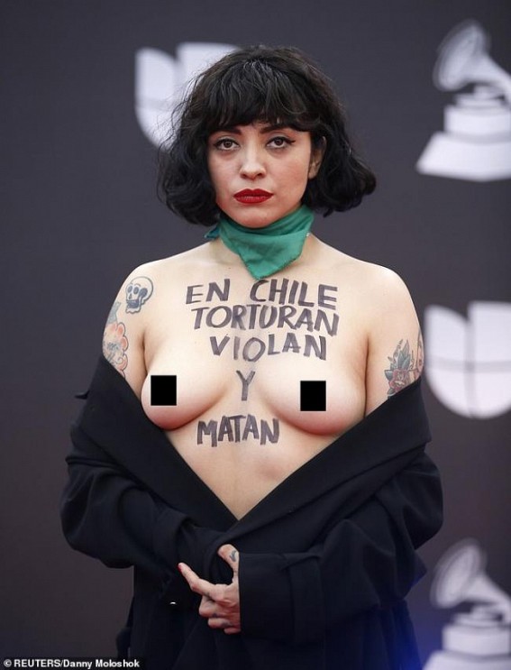 Chilean singer exposes breasts at Latin Grammys