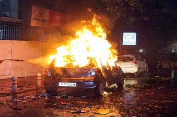 Car set afire near DCP's office, protests at Delhi Police HQ Car set afire near DCP's office, protests at Delhi Police HQ