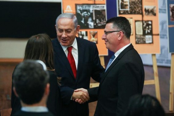 Israel's ruling Likud votes in leadership primary 