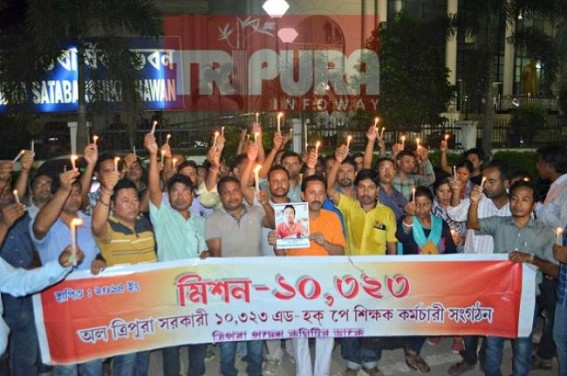 10323 Teachers held candle march rally for died Teacher Surajit Debbarma, blamed State Govt for his death, warned public not to insult 10323 teachers