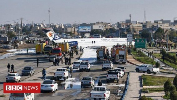 Iran plane slides onto highway after pilot 'misses' runway