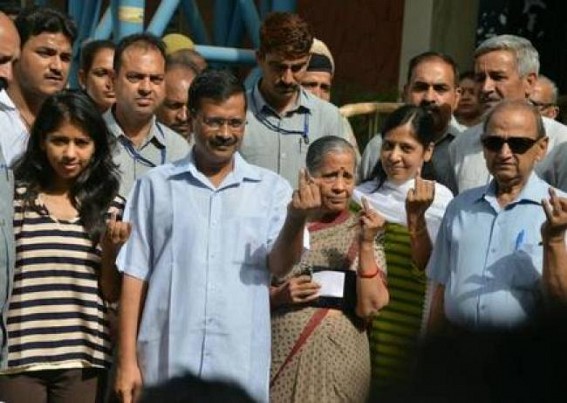 Arvind Kejriwal & family cast vote Arvind Kejriwal & family cast vote