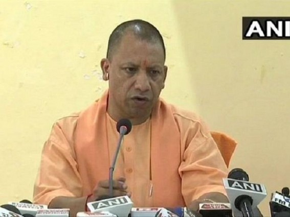 Yogi meets kin of dead cops, announces Rs 1-cr each to families Yogi meets kin of dead cops, announces Rs 1-cr each to families