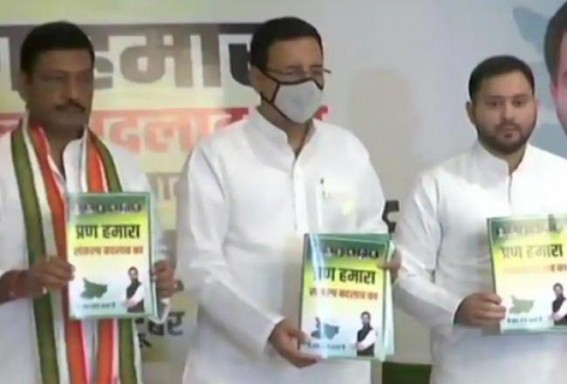 Grand Alliance releases Bihar poll manifesto, pledges change Grand Alliance releases Bihar poll manifesto, pledges change
