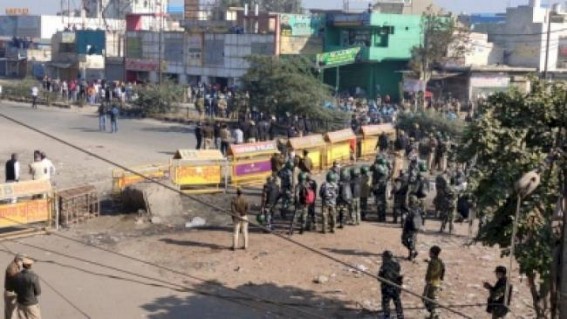 It's tense: Police use tear gas, water cannons & farmers pelt stones at Singhu