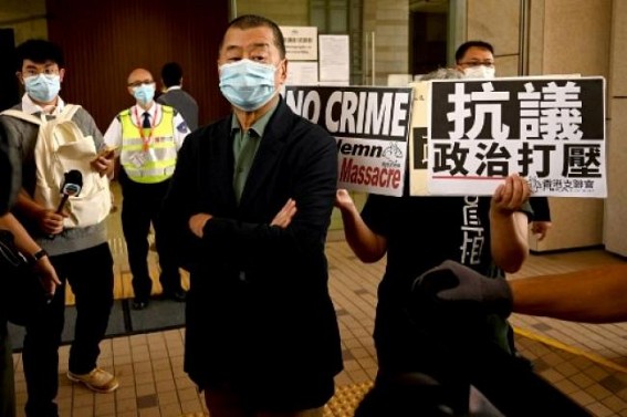 HK media mogul charged under security law