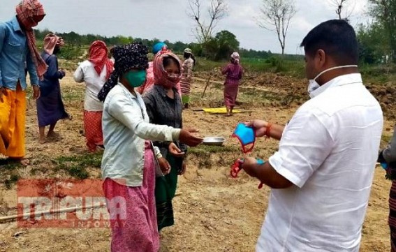 MLA Sushanta Chowdhury distributed masks among 500 MGNREGA card holders as State resumes MGNREGA works MLA Sushanta Chowdhury distributed masks among 500 MGNREGA card holders as State resumes MGNREGA works