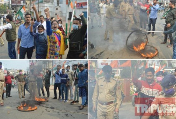 Congress Staged protest in BJP ruled Tripura in solidarity with Farmers on National Strike Day : Agitators burnt tires, Raised 'Modi Hatao, Desh Bachao' Slogan Congress Staged protest in BJP ruled Tripura in solidarity with Farmers on National Strike Day : Agitators burnt tires, Raised 'Modi Hatao, Desh Bachao' Slogan