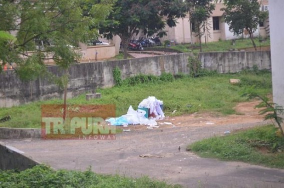 PPEs thrown outside COVID-19 Treatment Centre building  in GB hospital 