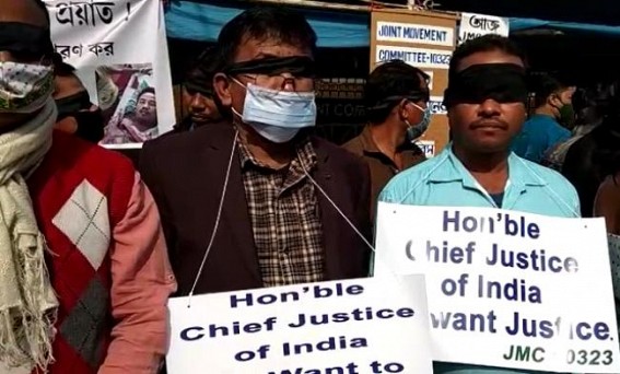 'Law has turned Blind in Case of 10323 Teachers', alleged agitating 10323 Teachers : Covered Eyes with Black Cloths to symbolize Blind Legal System on CJI's visit day in Tripura 'Law has turned Blind in Case of 10323 Teachers', alleged agitating 10323 Teachers : Covered Eyes with Black Cloths to symbolize Blind Legal System on CJI's visit day in Tripura