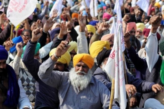 End agitation, hold talks: Modi to farmers