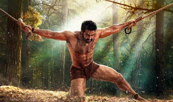 Jr NTR's ferocious look as 'Bheem' steams up 'RRR' poster Jr NTR's ferocious look as 'Bheem' steams up 'RRR' poster