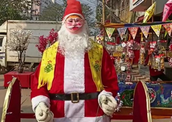 Agartala city gears up to Celebrate Christmas : Markets go trendy with glittering X-Mas Trees, Lights: Santa, Cakes display for Sales Agartala city gears up to Celebrate Christmas : Markets go trendy with glittering X-Mas Trees, Lights: Santa, Cakes display for Sales
