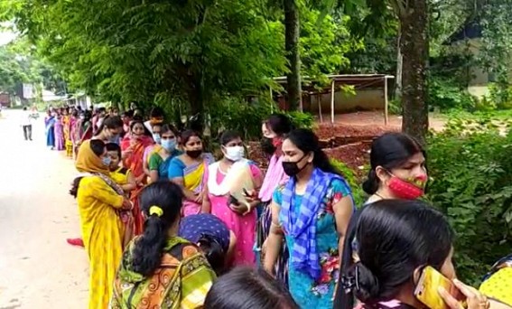 No Social Distancing in Covid Vaccination Centres : Public standing in long rows under the Sky amid Rainy Weather No Social Distancing in Covid Vaccination Centres : Public standing in long rows under the Sky amid Rainy Weather
