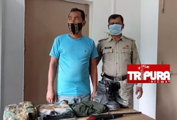 Police arrested a suspected militant on Wednesday with local gun and military uniform at Mandai Police arrested a suspected militant on Wednesday with local gun and military uniform at Mandai