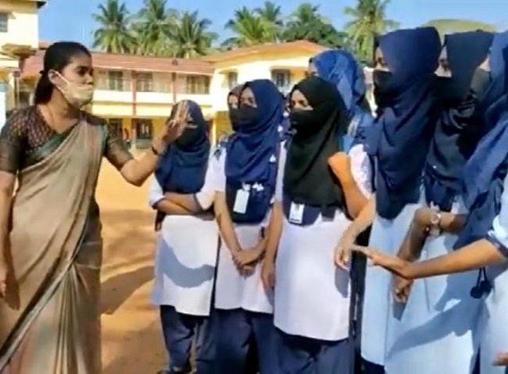 Hijab row: K'taka colleges reopen amid tight security Hijab row: K'taka colleges reopen amid tight security