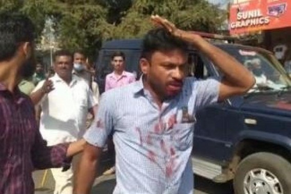 Teacher, Muslim student beaten as hijab row protests turn violent in K'taka Teacher, Muslim student beaten as hijab row protests turn violent in K'taka
