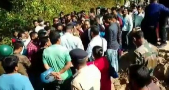 Tripura BJP MLA Sudhangshu Das was prevented from entering own area with 'BJP, Go Back' slogan : MLA's Photo Garlanded with Shoes by Locals Tripura BJP MLA Sudhangshu Das was prevented from entering own area with 'BJP, Go Back' slogan : MLA's Photo Garlanded with Shoes by Locals
