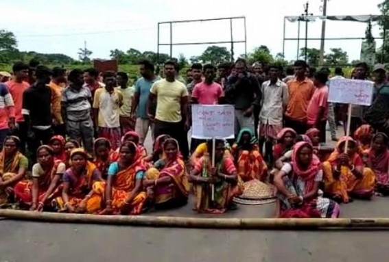 Tea workers of Lakshmi Lunga and Tufania Langa blocked Bamutia main road on Tuesday morning over changing of Tea Garden Ownership