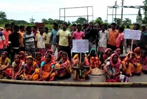 Tea workers of Lakshmi Lunga and Tufania Langa blocked Bamutia main road on Tuesday morning over changing of Tea Garden Ownership Tea workers of Lakshmi Lunga and Tufania Langa blocked Bamutia main road on Tuesday morning over changing of Tea Garden Ownership