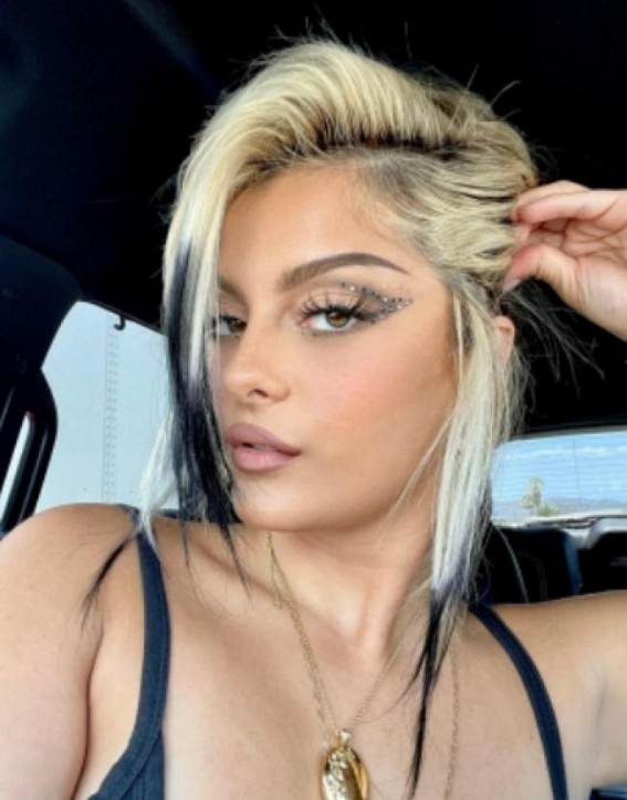 Bebe Rexha rushed off stage after phone hits her on the face