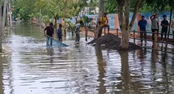 People spotted catching Fish on Road as AMC areas gone under water after Heavy rain People spotted catching Fish on Road as AMC areas gone under water after Heavy rain