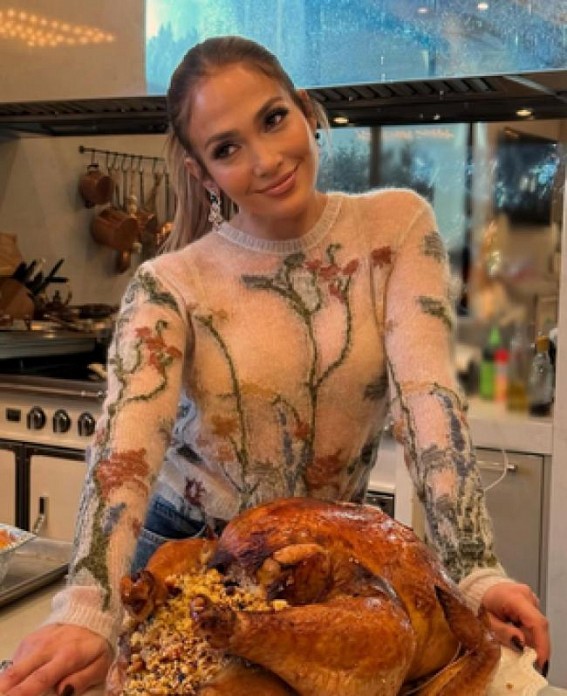JLo poses with a large Turkey as she expresses gratitude JLo poses with a large Turkey as she expresses gratitude
