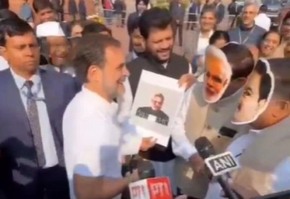 Congress MPs protest in Parliament with Modi and Adani masks Congress MPs protest in Parliament with Modi and Adani masks
