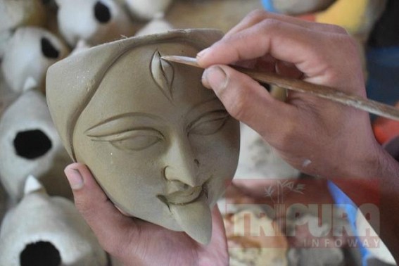 Artisans busy in preparation of Kali Puja Artisans busy in preparation of Kali Puja