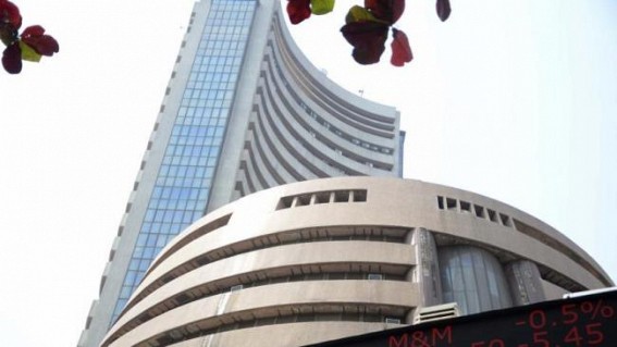 Sensex, Nifty trade flat; RIL in the green